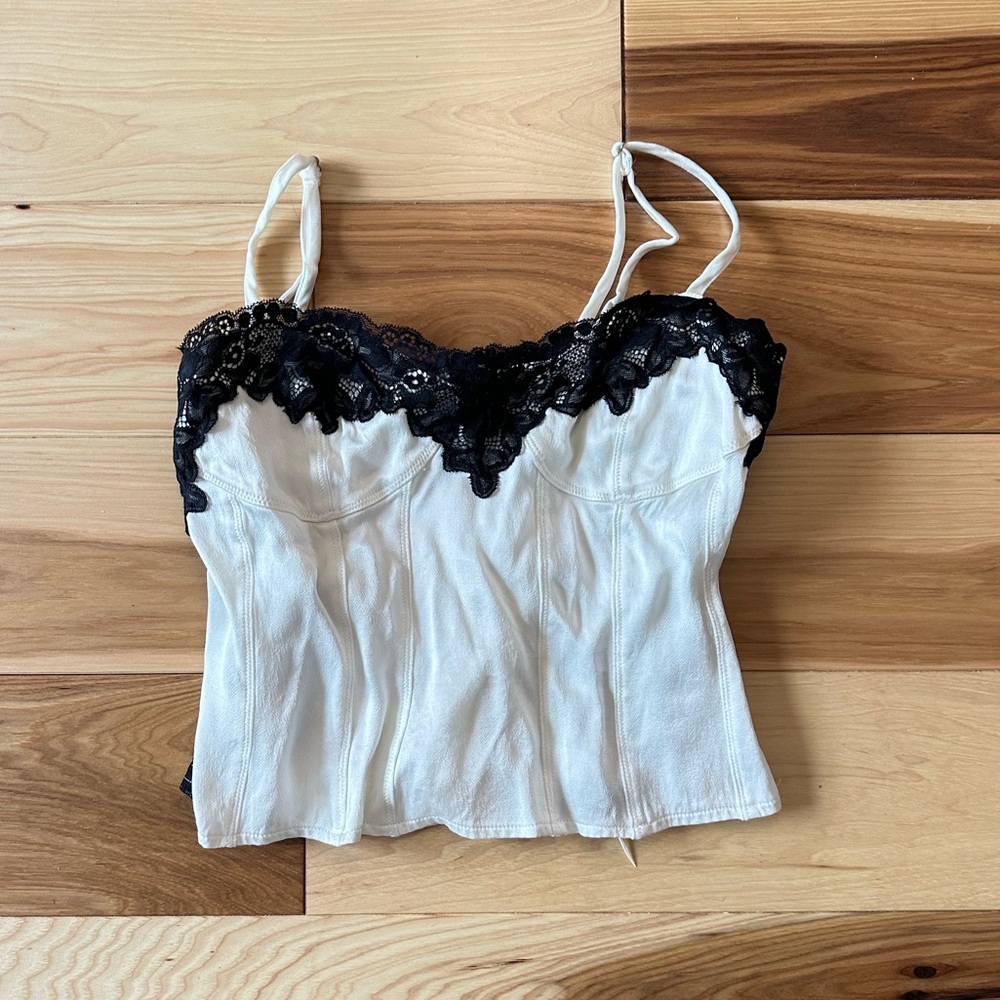 White and black corset style top with lace detailing
